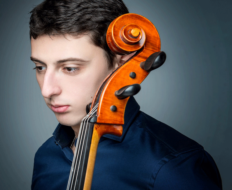 publicity photo of young cellist Narek Hakhnazaryan, who performed with the Boston Chamber Music Society at Sanders Theatre